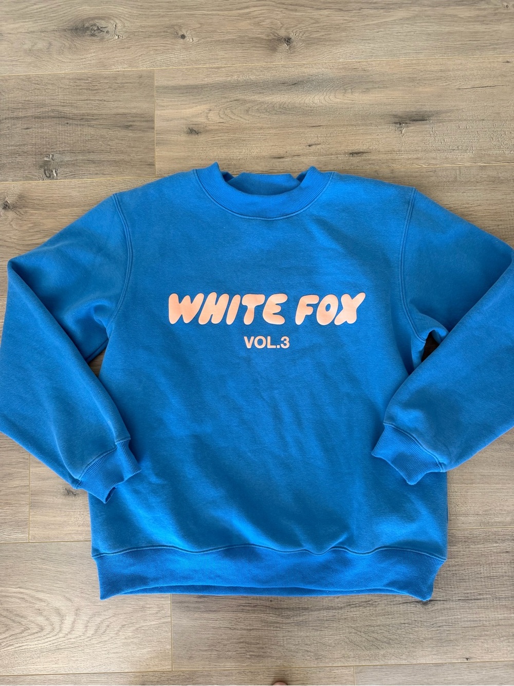 White Fox Boutique Blue Crewneck Sweatshirt with Light Pink Logo